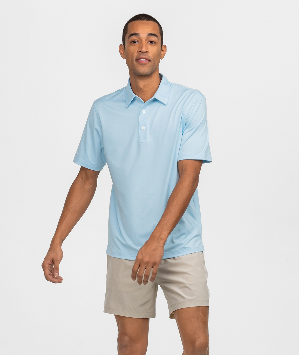 Man in Grayton Heather Polo enjoying a sunny Southern day, highlighting comfort and style